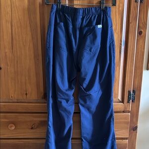 Grey's Anatomy Navy Blue scrubs.